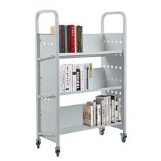 a metal book shelf with books on it