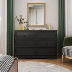 a bedroom with green curtains and a black dresser