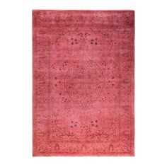 an antique persian rug with pink and red colors on the ground, in front of a white background