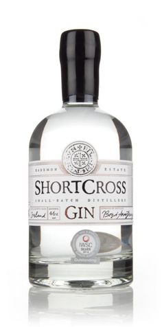 a bottle of shortcross gin on a white background