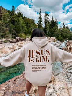 Jesus is king sweatshirt, Jesus is king hoodie, Jesus hoodie, Christian hoodie, Christian merch, Christian clothes, Christian streetwear, Gospel shirt, Jesus clothes Purchases above $35 are eligible for free shipping. 🐣 NOTE: Our female model wears a 2XL size sweatshirt. Our sweatshirts are unisex and true to size. For an oversized look, you need to order 1-2 sizes bigger than your normal size. We house several industrial printing technologies that allow us to apply ink directly into a textile, so there is no fading, peeling, or cracking. ⇒ How Do I Order ❶ Please review all the information provided before placing your order ❷ Select the item type and size using the drop-down menu ❸ Select the color of the shirt/hoodie using the following drop-down menu. Don't ignore checking all color op Christian Gift Shop, Jesus Clothes, Christian Streetwear, Jesus Is King, Love Like Jesus