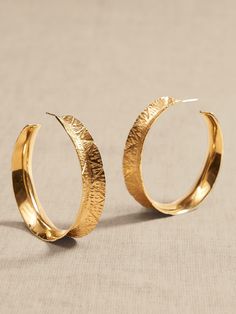 DESTINATION COLLECTION: Designed for dreamers, these pieces reflect the distinctive beauty of the destinations that inspired them, showcasing the striking qualities of semi-precious stones and natural materials as a call to explore- even if only in t Brass Rings Jewelry, Brass Hoop Earrings, Brass Hoops, Steel Post, Jewelry Photography, If Only, Semi Precious Stones, Brass Jewelry, A Call