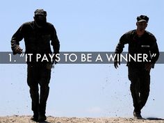 two men are running in the sand with words that read, 1 it pays to be a winner