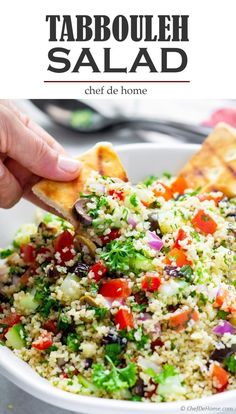 a bowl full of tabbouleh salad with tortilla wedges