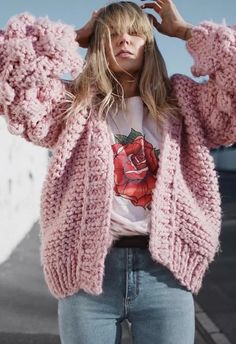 Cardigan season is right around the corner and this thick candy pink knit sweater is the perfect pop of color to splash into you.    Open front  Handmade chunky knit  Pom-Pom sleeves  Ribbed cuffs and hemline  Knit fabric provides flexibility  Not lined  100% Acrylic  Hand wash/Dry clean    size & fit      CM   IN                    Size         Length         Bust         Shoulder  Sleeves                   XXS/XS         69         Free         40         68                   S/M         70 Wide Sleeve Sweater, Sweater And Jeans, Pink Knit Sweater, Open Front Sweater, Chunky Cardigan, Inspo Outfit, Outfit Look, Pink Cardigan, Cool Sweaters