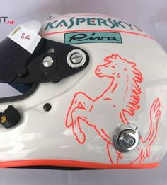 a helmet with an image of a horse on the front and side, attached to it