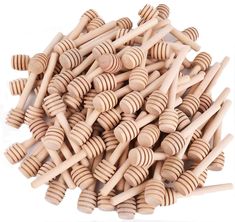 wooden pegs are stacked on top of each other to be used as decorations or crafts