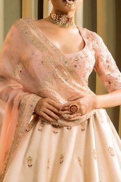 Ivory pink can can attached ombre lehenga featuring thread embroidered paisley, floral jaal motifs embellished by sequins and beaded tassels. Comes with matching padded blouse and dupatta. - Aza Fashions Cream Lehenga With Pallu, Cream Choli With Intricate Embroidery, Elegant Pink Choli With Dupatta, Elegant Pink Choli, Elegant Pink Lehenga With Pallu, Formal Pink Embroidered Dupatta, Wedding Sets With Pink Motifs, Traditional Cream Lehenga For Formal Occasions, Elegant Pink Embroidered Lehenga