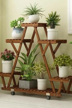 wooden Many Tiered Plant Stand Display Diy Wooden Planters, Tier Plant Stand, Plant Stands Outdoor, Wooden Plant Stands, Wood Plant Stand, Plant Stand Indoor, Wooden Planters, Plant Stands, Wood Home Decor