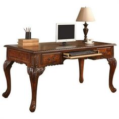 Please Note: Accessories not includedCreate a stylish and royal work environment with this special cherry walnut 60 Inch Executive Desk. The desk special features a masculine look with 2 drawers and a pull out center drawer for your keyboard. This durable executive desk is made of burl wood, veneered and has a 2 tone of cherry and walnut. The rectangular shape will provide you with ample space for your computer and to spread out your work in front of your monitor. The legs are curved with hand carved panels around the desk.Dimension: 60"L x 33"D x 33"HColor: Two Tone Cherry w/ WalnutMaterial: Burl Wood, Veneered Color: Multicolor. Victorian Desk, Wood Office Desk, Desk Dimensions, Wood Office, Traditional Office, Sales Desk, Wood Room, Desk And Chair Set, Durable Furniture