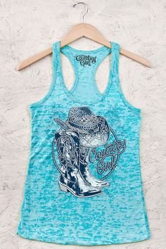 Juniors Country Girl® Boots Burnout Racerback Tank - Country Fashion Clothing | This Country Girl ® tank top features rhinestones. Our junior Burnout Racerback Tank is made with a 3.7 oz., 65% polyester / 35% combed ring spun cotton burnout jersey fabric. • Fabric laundered to reduce shrinkage • 1 x 1 burnout baby rib knit • Self-fabric bound neck and armholes • Fitted silhouette Country Background, Country Girl Boots, Buckled Boots, Brand Gifts, Snowy River, Girl Tank Top, Girl Boots, Country Girls Outfits, Country Clothing