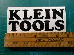 a ruler with the words kleen tools on it