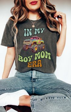 Calling all proud boy moms! ️ Are you living in the fast lane with your little daredevils? Rev up your style with our exclusive Boy Mom Era T-shirt featuring a roaring monster truck, designed just for you! 👕 Unisex Comfort: Crafted from ultra-soft, breathable fabric, this T-shirt offers the perfect blend of comfort and style. It's available in a range of sizes, ensuring a fantastic fit for everyone. 🔥 Unique Design: Our eye-catching monster truck design celebrates the adventurous spirit of you Monster Truck Shirt, Mom Pride, Mom Of Boys Shirt, Truck Shirt, Boy Mama, Expecting Mom Gifts, Truck Shirts, Mom Era, Toddler Mom