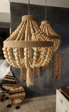 a wooden chandelier hanging from the ceiling