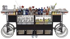 an image of a bar cart with drinks on it