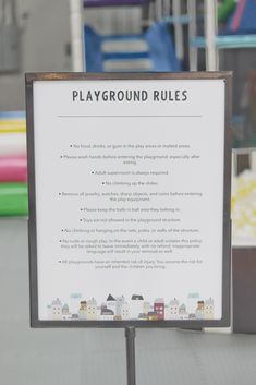 there is a sign that says playground rules