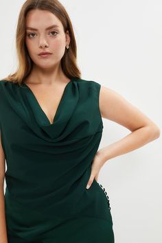 A decidedly dramatic choice for your next black-tie ball, this sweeping satin maxi dress showcases a draped cowl neckline, neat row of fabric-covered buttons and sultry diagonal panel in a sumptuous fabric. Fitted with a seductively high hem split, it adds instant drama to special occasions.Expertly designed for those size 18 and above, our plus size collection is perfectly proportioned to ensure you look stylish at every shape.Style: Fit & Flare DressDesign: PlainFabric: SatinLength: MaxiNeckline: CowlSleeve Length: Sleeveless Dresses Plus Size, Satin Maxi, Cowl Neckline, Satin Maxi Dress, Fabric Covered Button, Maxi Dress Green, Look Stylish, Covered Buttons, Fabric Covered