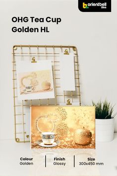 an advertisement for a tea cup and golden card holder