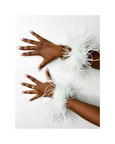 - Beautiful fluffy ostrich feather lace cuffs - Each pair is made to order   - 2 layers of feathers for extra full look - Add a touch of Hollywood glam to any outfit  - Easily removable so you do not have to worry about washing them with clothing or getting them dirty while eating etc. - Made with a lace inside (not metal slapstick) so they are soft and easily slip on and off the hand. - Fit most sizes as they have an elastic component to easily slip on and off.  Dimensions: 1.5" Width  11" Leng Feather Cuffs, Feather Cuff, Green Feather, Wedding Cuff, Feather Wedding, Art Deco Bracelet, Lace Cuffs, Ostrich Feather, Hollywood Glam