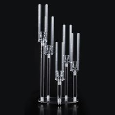 PRICES MAY VARY. Product Size: the heights of the 5 acrylic candlesticks: 3.7", 5.7", 7.6", 9.6", 11.5", the diameter of the round base: 8.6", the diameter of the opening: 0.8". cylinder shades high is 9.8" Notes: Please use LED candles.Candles in the pictures are not included in this set. 5 Arms Candelabra:This acrylic candle holder with a circular tube candlestick shape design and transparent candle cup and Hurricane Candleholders .Made of high-quality transparent acrylic material, finely poli Candle Holders Centerpieces, Acrylic Candle Holder, Candelabra Centerpieces, Table Transparente, Clear Candle Holders, Centerpieces For Wedding, Wedding Party Table Decorations, Candelabra Centerpiece, Multiple Candles