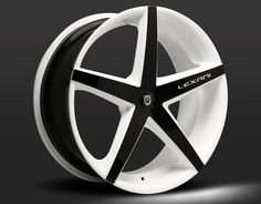 a white wheel with black spokes on a dark background, the rim is shown