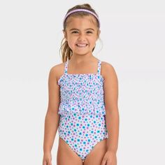 Cat & Jack Toddler Girls' Smocked One Piece Swimsuit ( Smocked Front With Playful Frills, Soft Tricot And Pique Materials, Crisscross Back, Sleeveless Design And Floral Print Pattern). Size: 12 Months Color: Multi Kids Swimsuits Bikinis, Japanese Uniform, Girls Smock, Easy Dressing, One Piece Swim, Swimsuit Shops, Sweet Style, Toddler Girl Outfits, Kids Beachwear