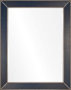 a black and gold framed mirror with beaded trim