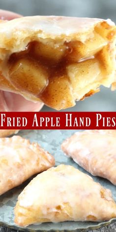 a hand holding up a piece of fried apple hand pie