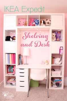 a white desk sitting in front of a book shelf filled with books and stuffed animals