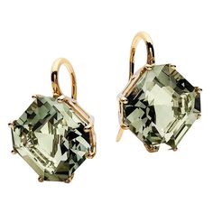 Introducing the exquisite Prasiolite Square Emerald Cut Earrings from 'Gossip' Collection. Crafted in 18K yellow gold, these earrings feature stunning square-cut Prasiolite gems suspended elegantly on French wires. The unique emerald cut of the Prasiolite stones exudes a captivating allure, making these earrings a perfect blend of sophistication and modern elegance, ideal for any occasion. Elevate your style with the subtle yet striking beauty of these remarkable earrings from the 'Gossip' Colle Emerald Cut Drop Earrings, Emerald Cut Earrings, Striking Beauty, Cut Earrings, Earring Ideas, Earring Display, Green Quartz, French Wire, Square Cut