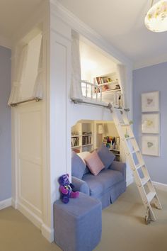 there is a loft bed in the corner of this room with a couch and ladder