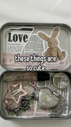 an open tin can filled with assorted items and the words i love these things are so cute