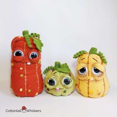 three crocheted fruits and vegetables sitting next to each other