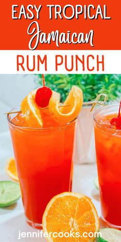 two glasses filled with orange rum punch and garnished with cherries