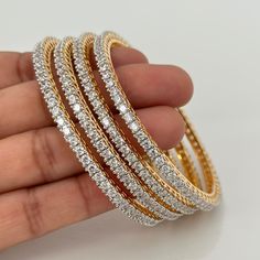 Set of 4 Gold American Diamond bangles /CZ Bangles/Bracelet/Indian Party Bangles/CZ stone bangle/Indian wedding/bridal jewelry American Diamond Delicate Bangles With 2 Tone Rhodium Plating 4 Pc Bangle Latest Design American Diamond Bangle Latest Diamond Bangles Designs, Cubic Zirconia Bangle For Parties, Wedding Crystal Bangle With Bling, Round Bangle With Sparkling Stones For Party, Hand Set Round Bangle For Party, Diamond Bangles Design, Round Bracelets With Sparkling American Diamond, Round Bracelet With Sparkling American Diamonds, American Diamond Bracelets With Sparkling Stones