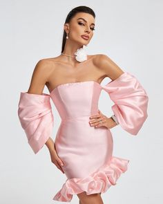 Turn heads in our Off Shoulder Satin Puff Mini Dress! This statement piece features a trendy off shoulder design and voluminous puff sleeves for a touch of drama. Made with satin fabric, it offers a luxurious and sleek look. Perfect for a night out, parties, or special occasions. Feel confident and stylish with this must-have dress! Our Style No.KLYF866 SatinHeight - 68.9"/175cm Bust - 34.6"/88cm Waist - 25.6"/65cm Hips - 36.6"/93cm and wears size S About Wholesale/Dropshipping, please contact u Off-shoulder Ruched Satin Mini Dress, Pink Voluminous Evening Dress, Chic Off Shoulder Dress With Puff Sleeves For Cocktail, Elegant Off Shoulder Puff Sleeve Dress For Evening, Silk Puff Sleeve Mini Dress For Evening, Elegant Strapless Satin Dress With Ruffles, Elegant Satin Strapless Dress With Ruffles, Chic Strapless Satin Dress, Feminine Puff Sleeve Mini Dress For Party