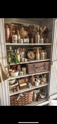 an old book shelf filled with lots of items