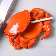 This quirky and playful ashtray features a unique design inspired by a big crab, adding a touch of fun and whimsy to your home decor. Perfect for any crab lover or anyone looking to add some personality to their space. Material:ResinSize:20cm(L)*13cm(W) (1 inch=2.54cm) Octopus Ashtray, Cool Trinkets, Funny Ashtray, Cool Ashtrays, Age Reg, Funny Crab, Big Crab, Garlic Storage, Decorative Ornaments