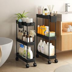 three tiered bathroom storage rack with soaps, shampoos and toiletries