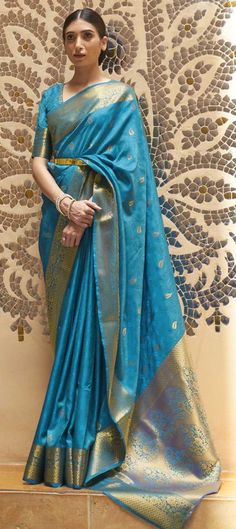 Cost Includes Saree,Unstitched BlouseFall & Edging Work Description: Blue color Saree in Kanchipuram Silk, Silk fabric with Weaving work Fabric: Kanchipuram Silk, Silk Work: Weaving Color Family: Blue Style: South Occasion: Traditional Saree Dimension: 530 Cm x 110 Cm ( L x W) Blouse Length: 80 Cm Approx Washing Instruction: Dry Wash Navratri Blue Chanderi Saree, Blue Tussar Silk Saree For Diwali, Blue Slub Silk Blouse With Zari Weaving, Blue Tussar Silk Blouse Piece With Zari Weaving, Festive Blue Tussar Silk Saree, Blue Tussar Silk Saree For Festive Occasions, Blue Handloom Katan Silk Blouse Piece, Blue Katan Silk Handloom Blouse Piece, Blue Slub Silk Saree With Zari Weaving