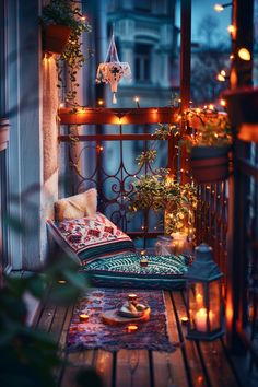 Cozy balcony decorated with string lights, candles, a comfy cushioned bench, and plants, creating a warm, inviting atmosphere. Apartment With Balcony Aesthetic, Balcony Hammock Apartment, Vintage Balcony Aesthetic, Pretty Balcony Aesthetic