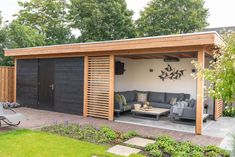 an outdoor living area with couches and chairs