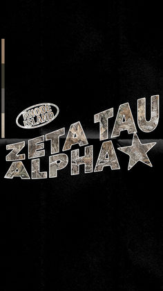 the words zeta tau and alphabet written in silver on a black background with white stars