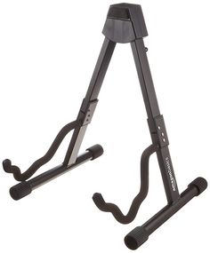 a pair of black bicycle racks with handles on each side and one holding the handlebars