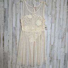 Free People Crochet Appliqué Mesh Dress M Boho Sheer Ivory Creme NWT Beige Lace Dress For Summer, Sheer Cream Lace Dress, Off White Lace Patchwork Summer Dress, Off White Lace Patchwork Dress For Summer, Beige Sleeveless Dress With Lace Work, Sleeveless Beige Dress With Lace Work, Sleeveless Beige Dress With Crochet Lace, Beige Sleeveless Summer Lace Dress, Beige Sleeveless Lace Dress For Summer