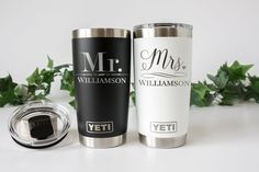 two personalized yeti tumblers next to each other