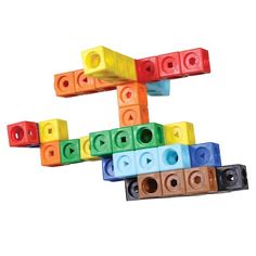 an assortment of colorful blocks are arranged in the shape of a letter t on a white background