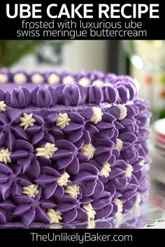 a close up of a cake with purple icing