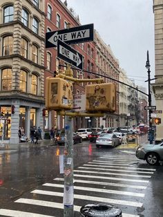 a street sign that is on the side of a pole in the middle of an intersection