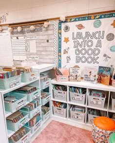 an organized classroom with lots of books and baskets on the shelves in front of it